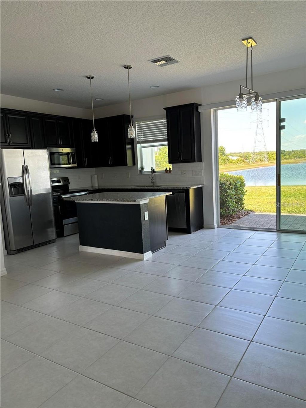 Photo of 2175 Sedge Grass Way, Orlando, FL 32824 (MLS # S5148366)