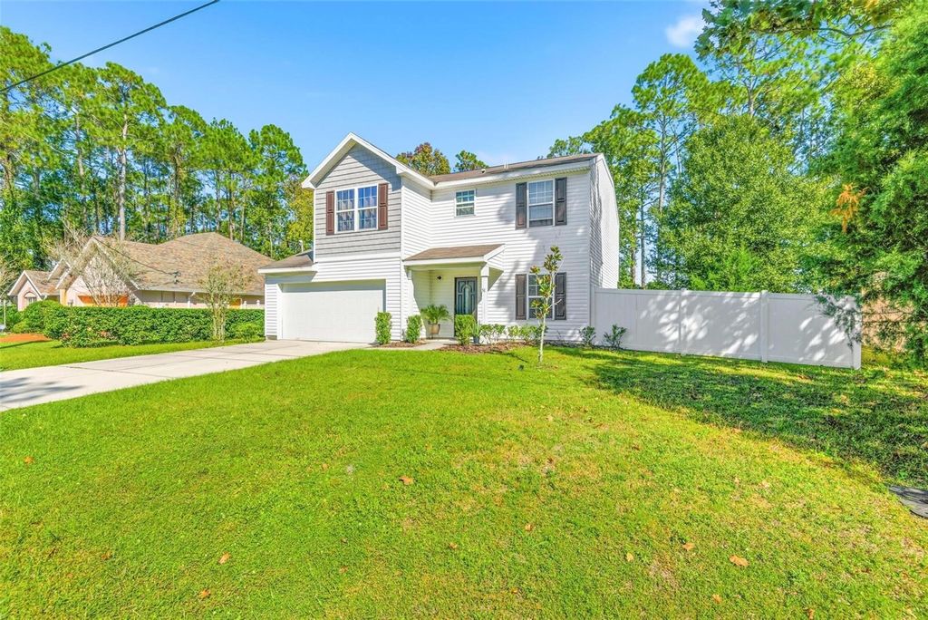 Photo of 51 Birchwood Drive, Palm Coast, FL 32137 (MLS # FC314307)