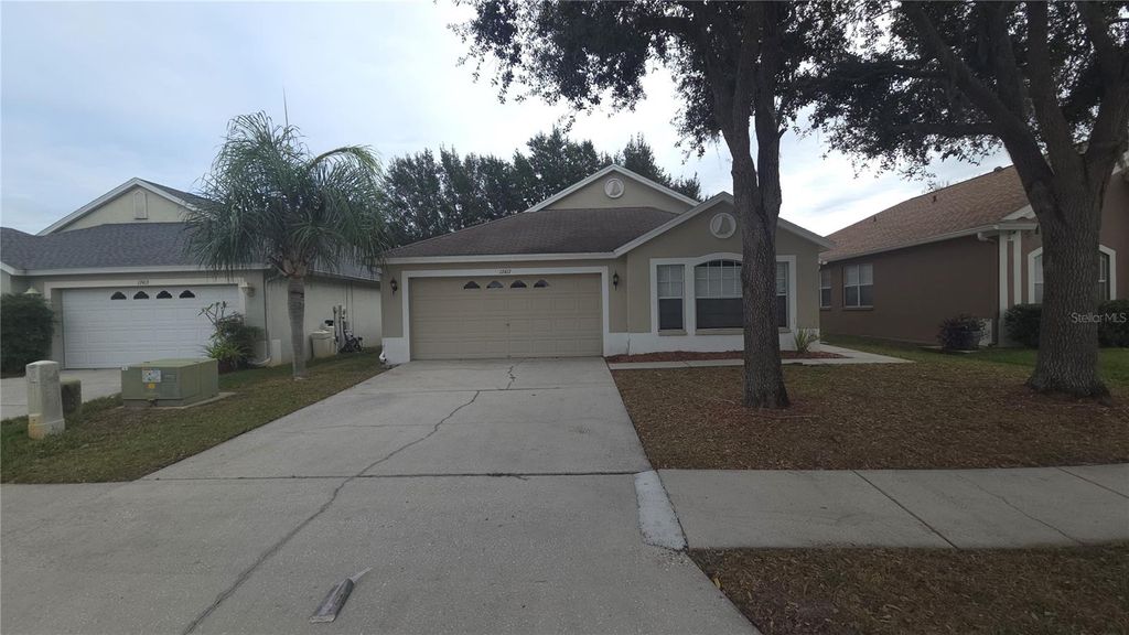 Photo of 17417 Lawn Orchid Loop, Land O Lakes, FL 34638 (MLS # O6366859)