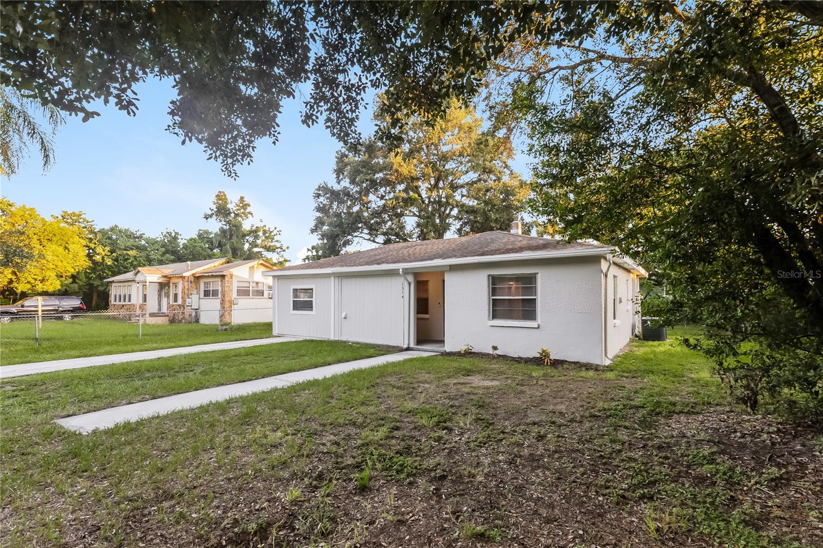 This turn-key ready Southeast Seminole Heights home is ready for it's next owner! Enjoy the freshly painted exterior and interior, brand new granite countertops in the kitchen, new stainless steel appliances, and a mixture of new LVP & ceramic tile flooring for effortless upkeep! Split floorplan! Fully fenced backyard for your furry friends! This sturdy block home ensures durability for years to come and is not in a flood zone! Roof replaced 2019 and water heater/AC in 2018. Convenient to wonderful local food destinations, breweries, grocery stores, and more...all while being just a short drive away to just about everything in Tampa!