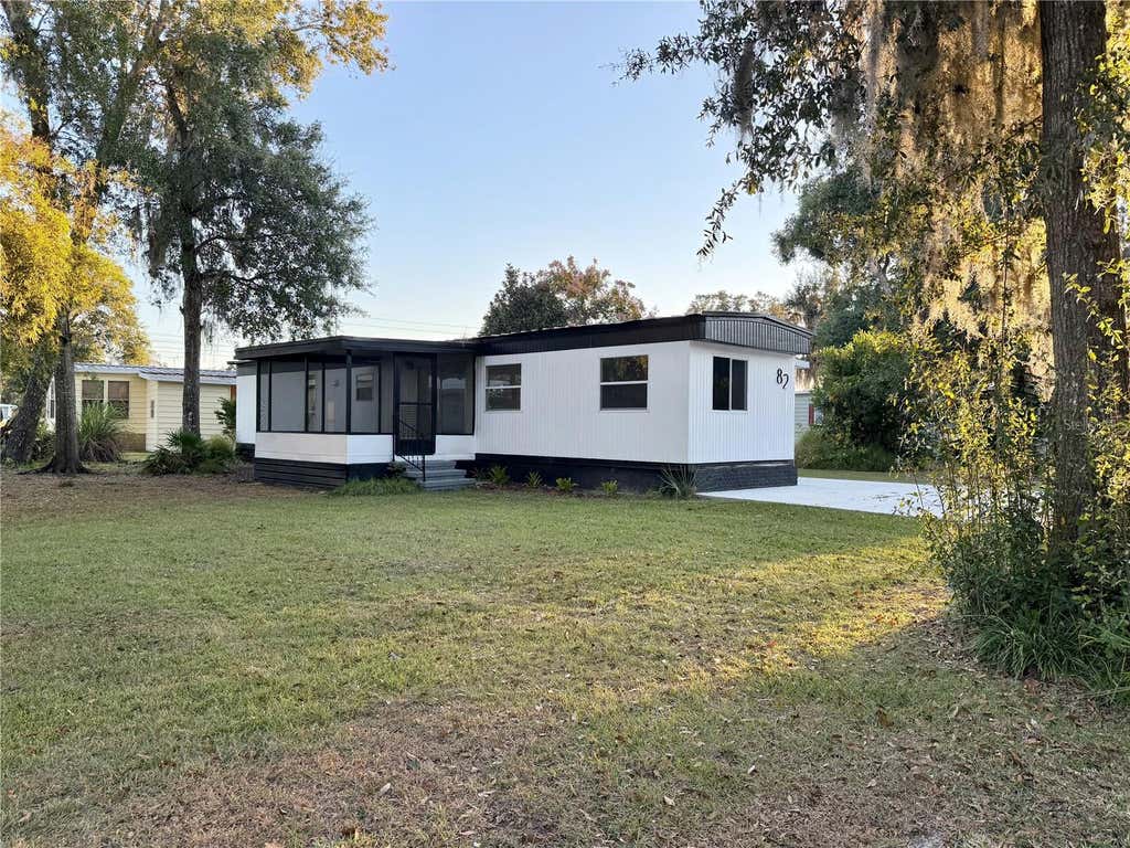 Photo of 82 N Bobwhite Road, Wildwood, FL 34785 (MLS # TB8530452)