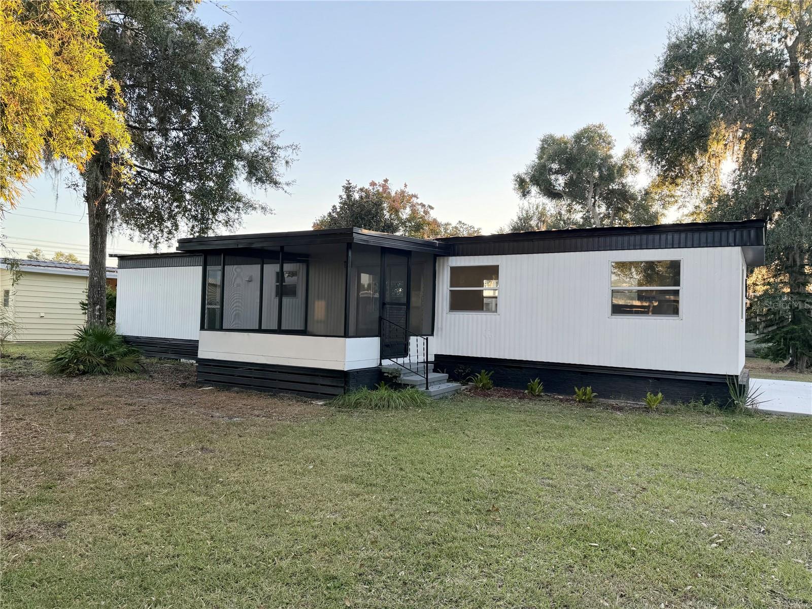 Photo 1 of 40 — 82 N BOBWHITE ROAD, WILDWOOD, FL 34785