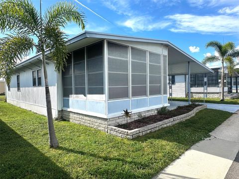 Photo of 34244 Canal Drive N, Pinellas Park, FL 33781 (MLS # TB8431246)