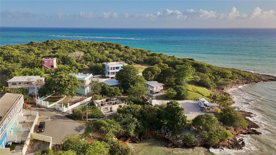 Experience an authentic everyday island escape with this premier oceanview multifamily property in Guánica, offering a rare combination of direct beach access and proximity to the south coast’s most beautiful "hidden gem" beaches. Situated on a 1,022-square-meter lot, this versatile compound provides unobstructed ocean views and a flexible layout perfectly suited for short-term rentals, a primary residence with income potential, or a multifamily investment. The surrounding region is a haven for coastal living, known for calm turquoise waters and snorkeling opportunities at nearby Playa Santa, Playa Manglillo, and La Jungla. Its location near the Bosque Seco de Guánica, a UNESCO-designated Biosphere Reserve, ensures long-term value and high experiential demand driven by the area's famous sunsets and marine activities.

The estate features three distinct concrete structures equipped with independent water and electric meters, a swimming pool, and ample parking. Structure 1 spans 1,637 square feet and includes two independent units—one 831-square-foot unit and one 806-square-foot unit—each offering two bedrooms and two bathrooms. This building is enhanced by a 1,263-square-foot rooftop with ocean views, 703 square feet of terraces, and an outdoor half-bath. Structure 2 offers 959 square feet of living space with two bedrooms and two bathrooms, complemented by a two-car carport, 1,250 square feet of terraces, and a 1,200-square-foot rooftop designed to maximize the coastal vistas. Finally, the 1,592-square-foot Structure 3 currently serves as a concrete warehouse, providing significant value-add potential for development into two additional residential units, a workshop, or a professional office.