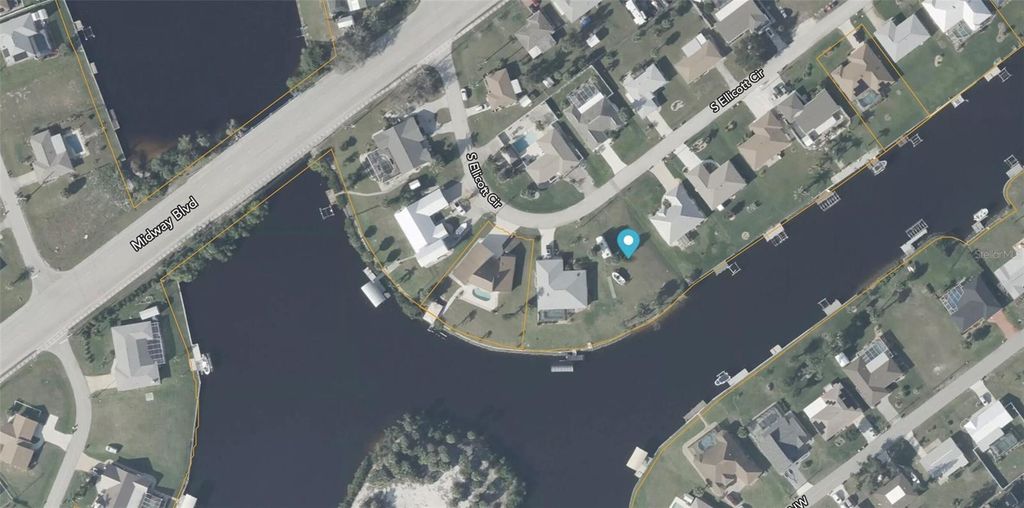 Photo of 783 Ellicott Circle NW, Port Charlotte, FL 33952 (MLS # GC537495)