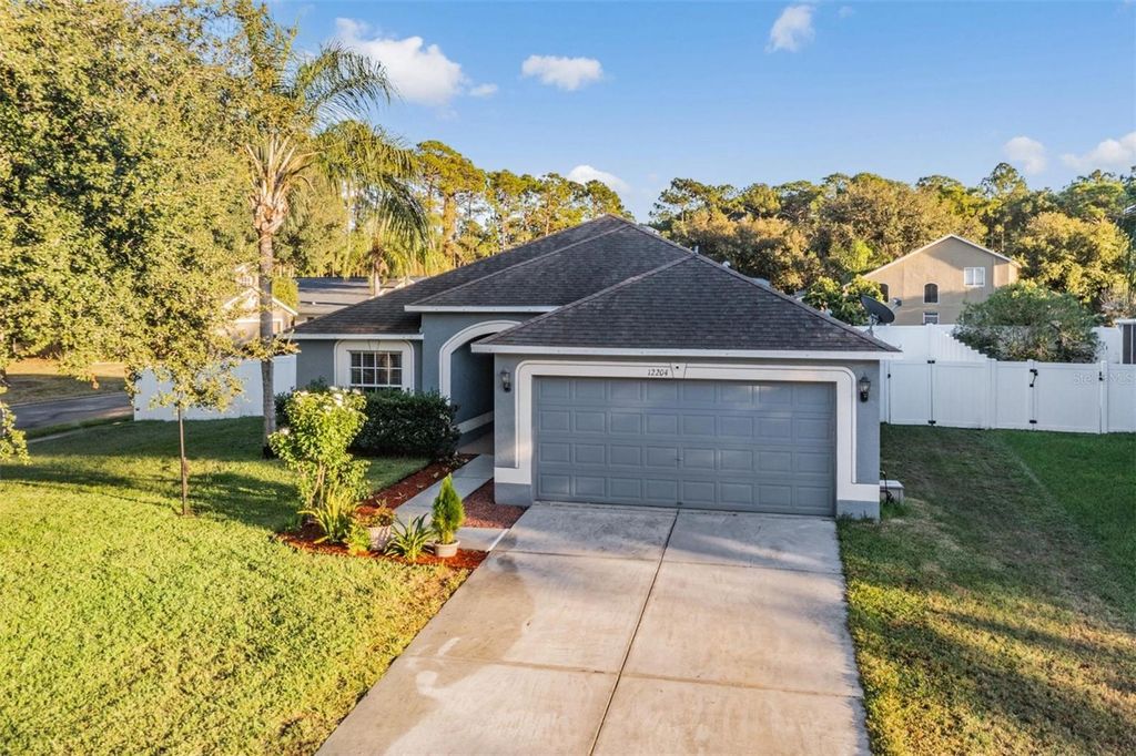 Photo of 12204 Luftburrow Lane, Hudson, FL 34669 (MLS # TB8439249)
