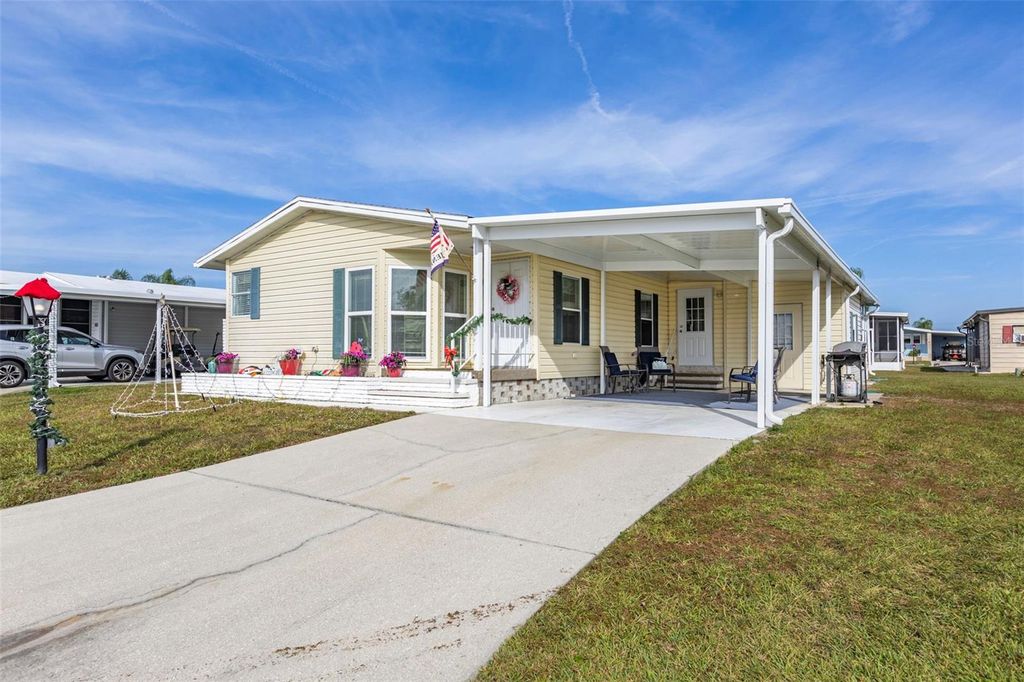 Photo of 512 La Playa Circle, North Port, FL 34287 (MLS # TB8455526)