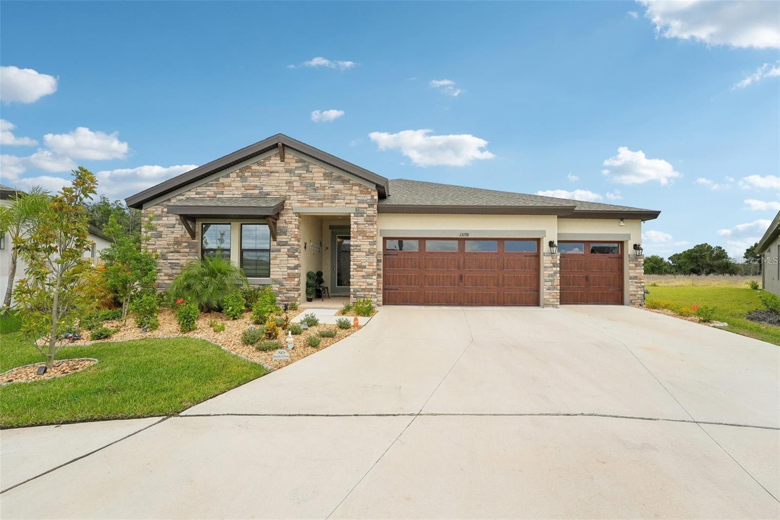 Welcome to 13098 Wellspring Drive, an exceptional 2024-built residence offering the perfect blend of modern luxury and Florida lifestyle. With 4 bedrooms, 3 full baths, Office/Study/Den and 2,537 sq. ft. of living space (3,670 sq. ft. total), this home is designed for comfort, entertaining, and everyday ease. Step inside to soaring ceilings and an open floor plan that floods the living spaces with natural light. The chef’s kitchen features premium finishes, an expansive island, and seamless flow into the dining and family rooms—ideal for gatherings both large and small. The private owner’s suite is a true retreat, complete with a spacious walk-in closet and spa-inspired bath with dual vanities, soaking tub, and separate walk-in shower. Three additional bedrooms and two full baths offer plenty of space for family, guests, or a home office.
Outdoors, enjoy the best of Florida living with your private pool, outdoor kitchen, and covered lanai—perfect for weekend entertaining or relaxing evenings at home. Situated on a generous 12,953 sq. ft. lot, the property provides both space and privacy.
As part of a vibrant HOA community, residents also enjoy resort-style amenities including multiple pools, pickleball courts, bocce ball, and more. Conveniently located near top-rated schools, parks, shopping, and dining, this home offers not just a place to live, but a lifestyle to love. Security System and Sound system do not convey. Don’t miss your chance to call 13098 Wellspring Drive home—schedule your private showing today!