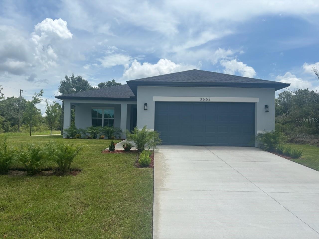 Discover this spectacular modern home with 1,615 square feet, located on a private corner lot of 0.25 acres in North Port. Featuring 3 spacious bedrooms and 2 elegant bathrooms, this residence elevates your lifestyle with high-end finishes in every corner. Key Features:
Open-concept design with high, decorative ceilings that provide a sense of spaciousness and natural light. Stunning chef-style kitchen with stainless steel appliances, a large central island, quartz countertops, and subway tile backsplash. Stylish tile flooring throughout the home — no carpets to maintain! Luxurious master bathroom with a glass-enclosed shower, offering spa-like comfort. Professionally installed irrigation system, perfect for keeping the yard pristine year-round. This home has it all: style, comfort, and location. Don’t miss the opportunity to live in a move-in-ready property you can enjoy from day one!