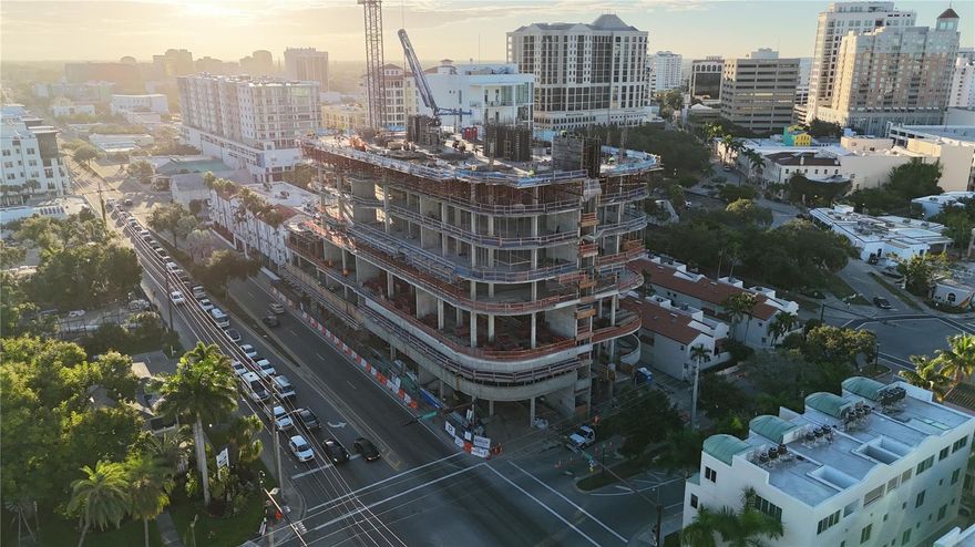 Under Construction. The Edge Sarasota embodies refined urban luxury in the heart of downtown’s vibrant Arts District. Residence B is an impeccably designed 3-bedroom, 3-bathroom corner residence offering over 3,500 square feet of living space, framed by floor-to-ceiling windows and sweeping city views from the 8th floor. The open-concept design features soaring ceilings, walls of glass and a chef’s kitchen with Italian cabinetry, Wolf and Sub-Zero appliances including a gas cooktop, an expansive island with waterfall edge and a butler’s pantry—all curated for elevated living. From the great room, dining or separate living room step out onto your private terrace and feel the energy of Sarasota below while enjoying the tranquility of your own modern sanctuary. The owners’ suite provides a true retreat with a gracious foyer, midnight bar, dual walk-in closets and en suite bathroom featuring dual vanities, private water closets, glass enclosed shower, soaking tub and convenient linen closet. A full laundry room with front-load washer and dryer and utility sink includes additional storage for ease of living.  
Beyond your residence, enjoy a curated collection of luxury amenities including a resort-style pool deck with hot and cold plunge pools, cabanas and two outdoor kitchens. The owners’ club focuses on wellness and entertainment with a fully equipped fitness center complete with a yoga room and infrared sauna. Two treatments rooms afford plenty of space for your personal massage therapist or a physical therapy session. The social room includes a lounge, bar, game room and catering kitchen. For more intimate gatherings, reserve the private dining room featuring resident wine lockers and a separate bar area. The building’s boutique size—only 27 residences—creates a community feel in the heart of Sarasota’s vibrant Arts District. Walk to acclaimed restaurants, galleries, boutiques, and the Bayfront, embracing a lifestyle that combines culture, convenience, and sophistication. Construction is progressing with limited opportunities to customize your finishes—secure your place at The Edge today and invest in a rare downtown Sarasota address with lasting appeal. Images shown are artist renderings intended to illustrate the interior finishes and design concepts for this community.