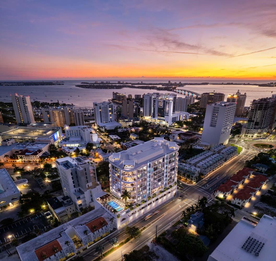 Under Construction. The Edge Sarasota embodies refined urban luxury in the heart of downtown’s vibrant Arts District. Residence B is an impeccably designed 3-bedroom, 3-bathroom corner residence offering over 3,500 square feet of living space, framed by floor-to-ceiling windows and sweeping city views from the 8th floor. The open-concept design features soaring ceilings, walls of glass and a chef’s kitchen with Italian cabinetry, Wolf and Sub-Zero appliances including a gas cooktop, an expansive island with waterfall edge and a butler’s pantry—all curated for elevated living. From the great room, dining or separate living room step out onto your private terrace and feel the energy of Sarasota below while enjoying the tranquility of your own modern sanctuary. The owners’ suite provides a true retreat with a gracious foyer, midnight bar, dual walk-in closets and en suite bathroom featuring dual vanities, private water closets, glass enclosed shower, soaking tub and convenient linen closet. A full laundry room with front-load washer and dryer and utility sink includes additional storage for ease of living.
Beyond your residence, enjoy a curated collection of luxury amenities including a resort-style pool deck with hot and cold plunge pools, cabanas and two outdoor kitchens. The owners’ club focuses on wellness and entertainment with a fully equipped fitness center complete with a yoga room and infrared sauna. Two treatments rooms afford plenty of space for your personal massage therapist or a physical therapy session. The social room includes a lounge, bar, game room and catering kitchen. For more intimate gatherings, reserve the private dining room featuring resident wine lockers and a separate bar area. The building’s boutique size—only 27 residences—creates a community feel in the heart of Sarasota’s vibrant Arts District. Walk to acclaimed restaurants, galleries, boutiques, and the Bayfront, embracing a lifestyle that combines culture, convenience, and sophistication. Construction is progressing with limited opportunities to customize your finishes—secure your place at The Edge today and invest in a rare downtown Sarasota address with lasting appeal. Images shown are artist renderings intended to illustrate the interior finishes and design concepts for this community.