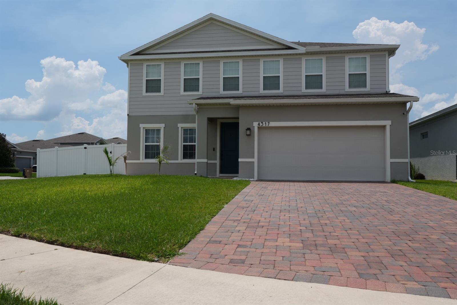 This is a beautiful 4 bed, 2.5 bath 3 car garage home. This home has a gorgeous two story layout. Starting from the entry, you see the open flex room to your left, which can easily become a study, and pass through the foyer opening into the large great room with a massive family room on the right and the kitchen and dining combo on the left. Sliding glass doors off the family room lead to a covered lanai, and a pergola perfect for entertaining or enjoying cool evenings. The kitchen has a large island, ample storage, and a walk-in pantry. Upstairs is a true oasis. The large loft at the top of the stairs offers a respite from the day. There are three large bedrooms and two bath as well as a convenient laundry room. Plus the Owner's Suite is large with a massive walk-in closet and en suite bath. The Owner's bath has an upgraded soaking tub and the shower has a roman style seat. The family can play in the community pool and you can relax reading a book. The resort-style amenities means you get to relax. Enjoy the convenience of access to major highways, downtown Orlando, the Orlando International Airport and, Lake Nona.