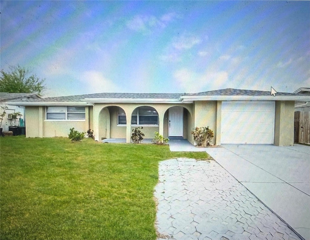 Photo of 7405 Oakshire Drive, Port Richey, FL 34668 (MLS # W7889118)