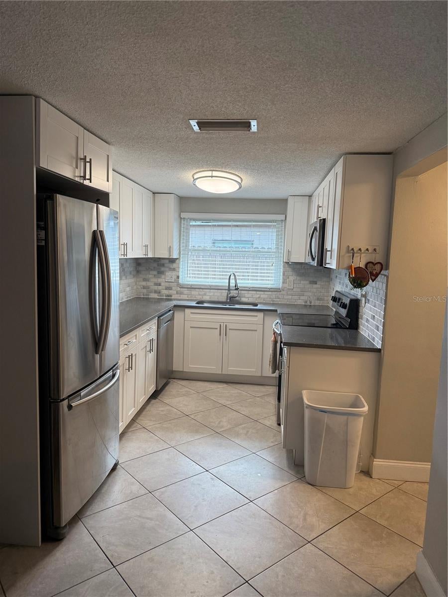 Photo of 7405 Oakshire Drive, Port Richey, FL 34668 (MLS # W7889118)