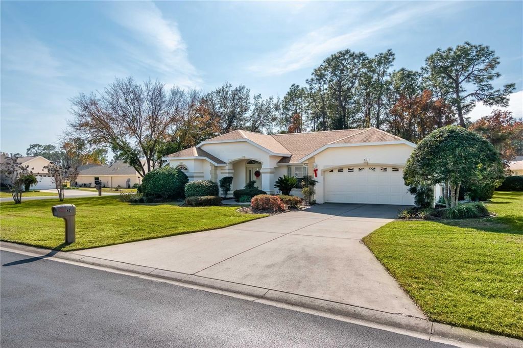 Photo of 67 Lake Diamond Blvd. Blvd, Ocala, FL 34472 (MLS # OM716455)