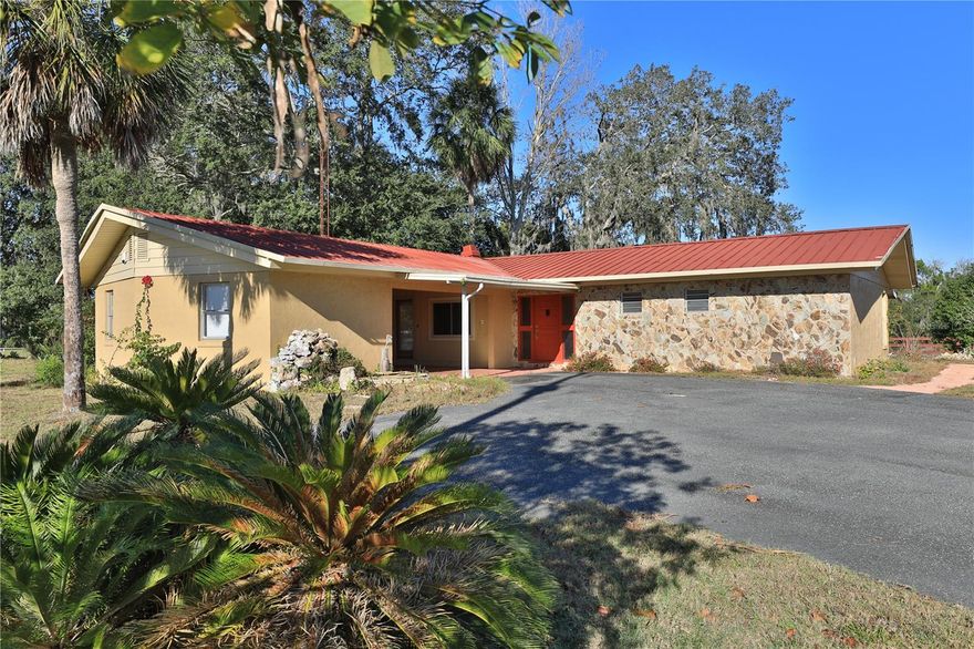 This versatile 6.79+/- acre property offers prime frontage along Highway 484, conveniently located between Ocala and Belleview. It is surrounded by established businesses and is poised for future growth. The property includes a 3-bedroom residence, featuring two bedrooms within the main house connected by a breezeway to a separate ensuite bedroom. Additionally, the property boasts lush green pastures and an income-generating billboard. The property is ideally situated near Florida Greenways and Trails and the Florida Horse Park. This is a rare opportunity that combines an excellent location with flexibility and income potential. Located just two miles from Interstate 75.