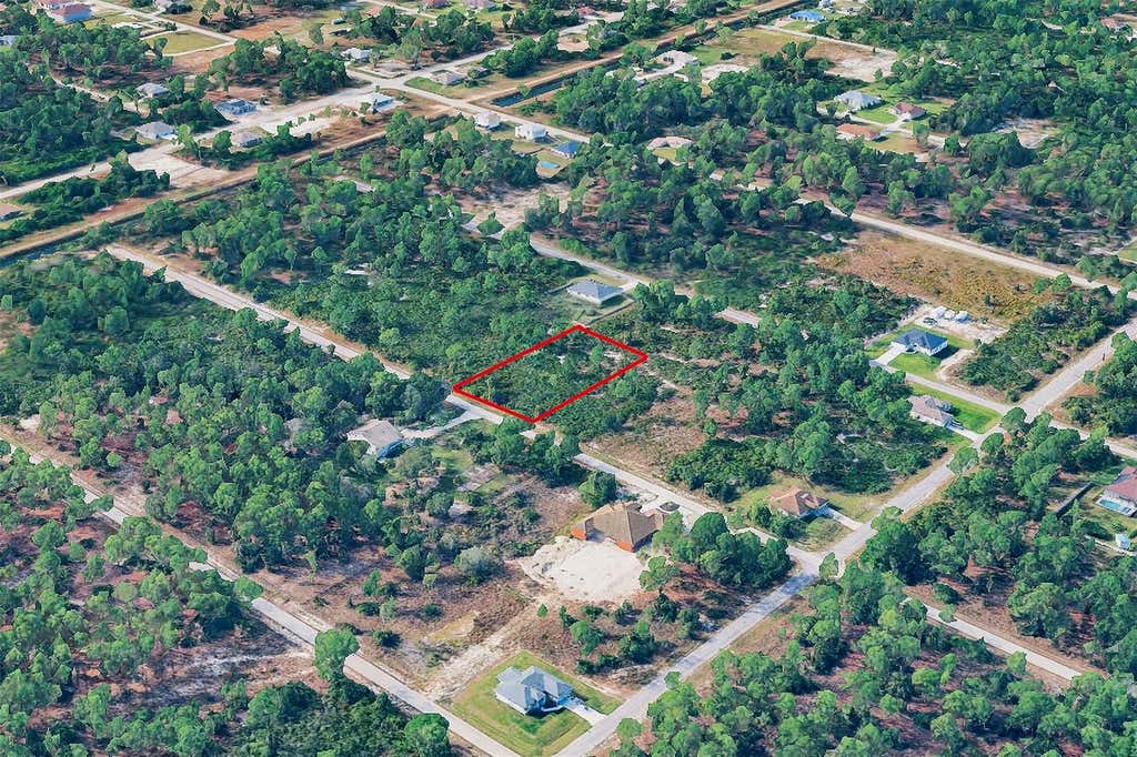 Photo of 1215 Palmetto Avenue, Lehigh Acres, FL 33972 (MLS # O6436483)
