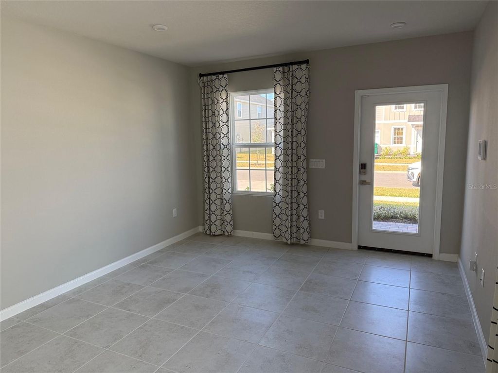 Photo of 1200 Port Blue Way, Lady Lake, FL 32159 (MLS # OM715198)