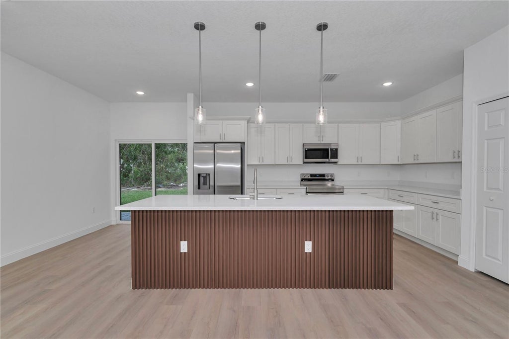 Photo of 1263 W Fan Drive, Citrus Springs, FL 34434 (MLS # OM732795)