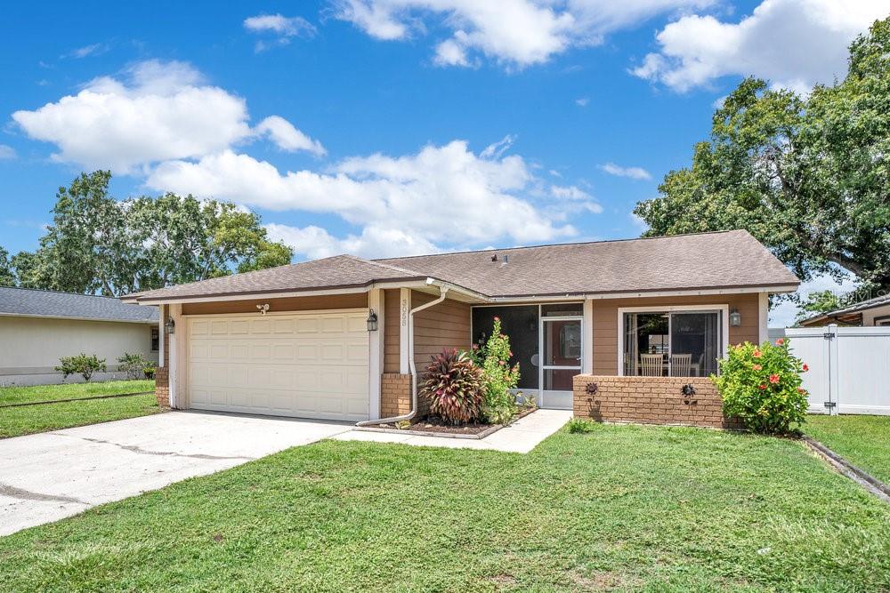 This property qualifies for a credit up to $5550 through the seller's preferred lender **WELCOME HOME** Located in the established East Orlando community of Curry Ford Woods, this single story 3-bedroom, 2-full bath home offers space, comfort, and a peaceful backyard retreat with NO REAR NEIGHBORS and tranquil WATER VIEWS! Step inside to FRESH PAINT, easy care TILE FLOORS throughout, and soaring ceilings that create a bright, open feel from the moment you enter. Oversized sliding glass doors connect the main living area to a SCREENED LANAI and fully fenced backyard – perfect for relaxing evenings, weekend BBQ’s, or simply enjoying the view. The large kitchen is designed for everyday living and entertaining alike, well equipped with must have STAINLESS STEEL APPLIANCES, complimentary countertops and hardware, and a spacious eat-in area ideal for casual meals or your morning coffee. A generous PRIMARY SUITE at the end of the hall gives the owner sliding glass doors that open to a side patio, WALK-IN CLOSET and private en-suite, while bedrooms two and three (also spacious!) share a second full bath. Both bathrooms have been updated and major systems have been taken care of – the ROOF & A/C were replaced just 7 YEARS ago. One of the standout features of this community is the convenience of having a walking gate entrance into the elementary school and you are located just off Curry Ford Rd putting you minutes from Downtown Orlando, Waterford Lakes, Lee Vista, Lake Nona and the Orlando International Airport. You have easy access to major roadways like SR 417, and shopping, dining, parks and more are all close by. This well maintained home is ready for you to MOVE RIGHT IN – schedule your tour today and start enjoying East Orlando living at its most convenient!