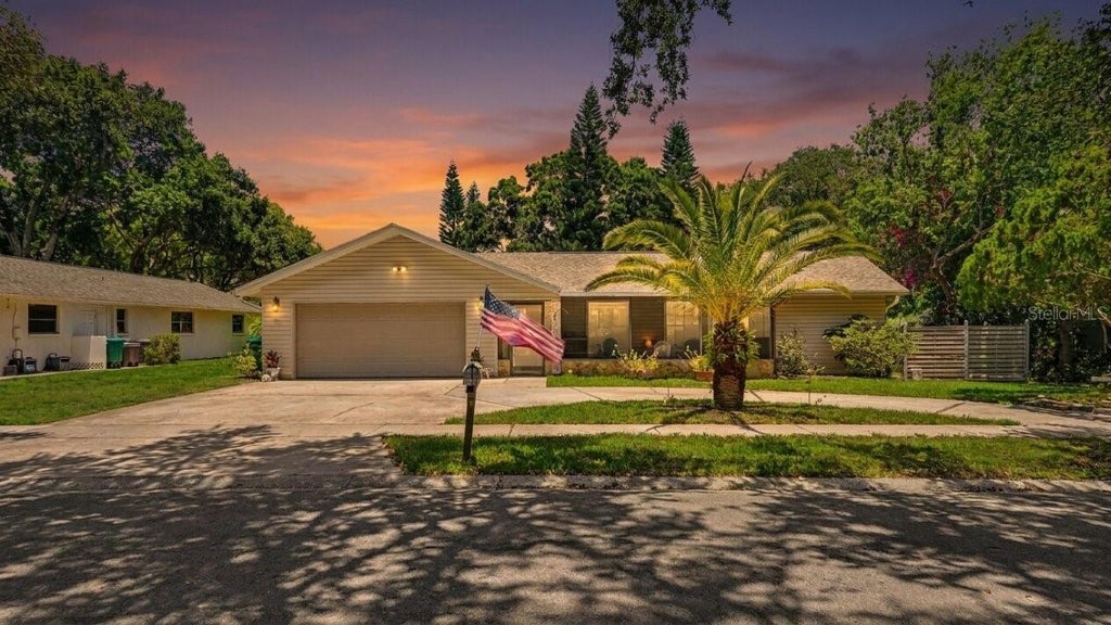 Photo of 165 Woodcutter Lane, Palm Harbor, FL 34683 (MLS # TB8522654)
