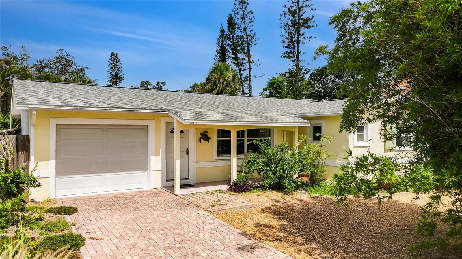 Welcome to this light-filled, airy 2-bedroom, 2-bath home with a sparkling private pool and an open-concept layout perfect for coastal living. The beautifully renovated kitchen features modern finishes and flows seamlessly into the spacious living and dining areas. A unique bonus artist studio or flex space offers the perfect spot to create, work, or relax. The one-car garage provides storage and convenience. Nestled in the sought-after Marina District, just blocks from the water, parks, and all the charm that Gulfport brings. Home did suffer minimal flooding and has been repaired with permits