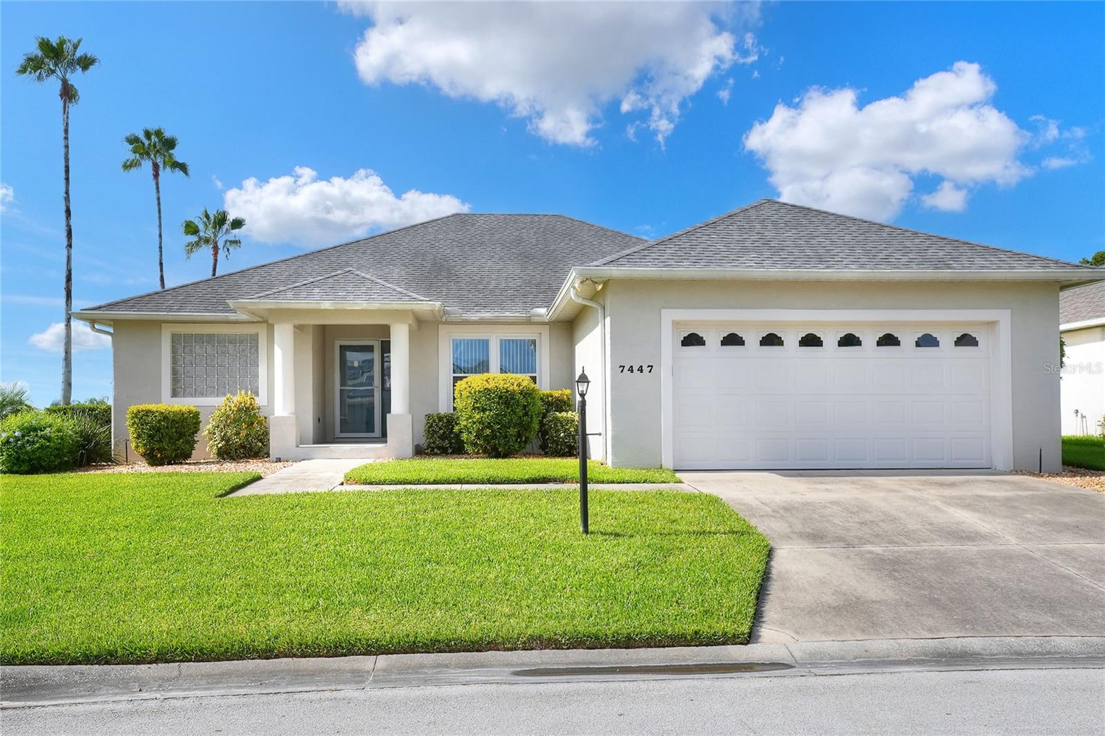 Beautifully maintained, this 4/2/2 pool home awaits! Lush, mature landscaping greets you upon arrival. From your entry point, you can see the sparkling pool through the brand new triple sliders. This pool is equipped with safety fence should you need, and the surface is in pristine condition. The pool screen helps maintain the crystal clear appearance of the pool. The vast open space of the living area separates living in three directions, making this floorpan conducive to multi-gen use, or designation of an office. The primary suite sports an ensuite with a soaking tub begging to sooth your soul at the end of a long day! New, modern sliders open onto the pool deck, and provide a lovely view. On to the dining area, you have a large window overlooking the pool. The kitchen has newer appliances, and is spacious enough for more than one home chef at a time! bedrooms located off of the kitchen are separated by a spacious bathroom. Laundry is inside, located off the kitchen for convenience. Solar panels are in place and are owned, placed by the same company at the time of the roof in 2019. Reclaimed water is utilized for lawn irrigation and the Rainbird system can help you manage watering days! This is a beauty you don't want to miss! Make your appointment ASAP!