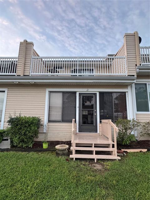 Photo of 11001 SE Sunset Harbor Road #D21, Summerfield, FL 34491 (MLS # TB8496215)