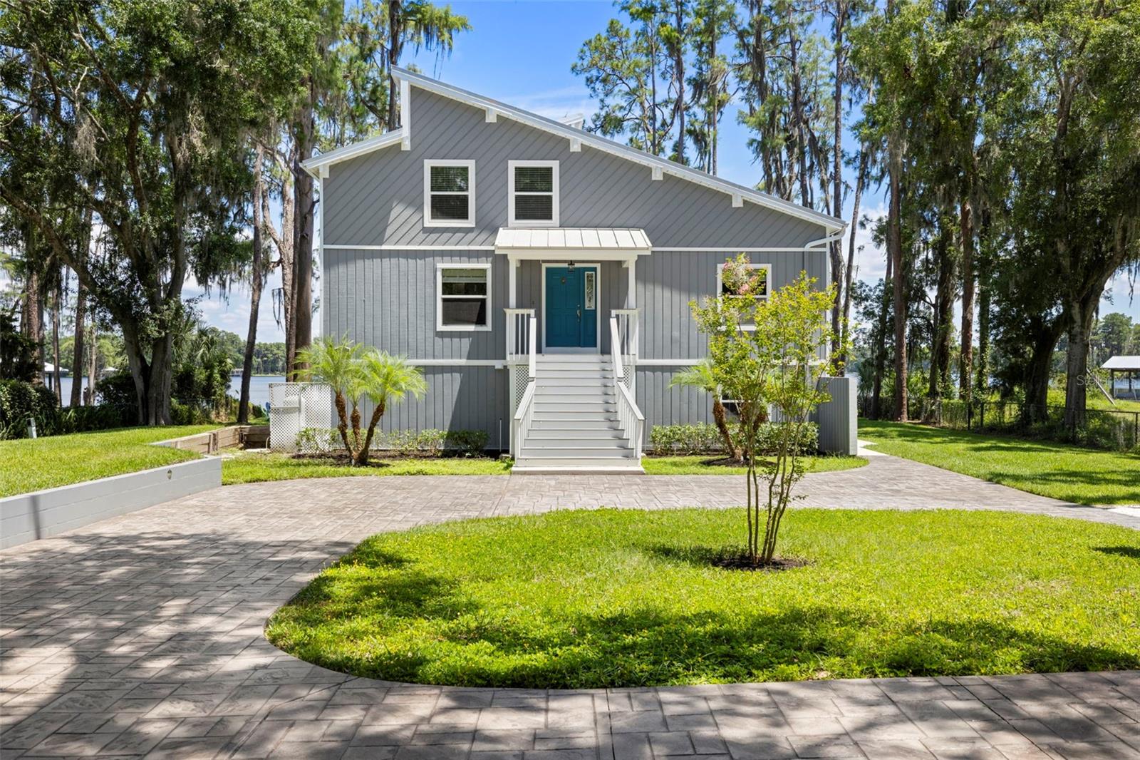 Tucked inside one of Tampa Bay’s best-kept secrets — the private, spring-fed waters of Lake Hiawatha — this extraordinary 4 bed, 3.5 bath estate offers over 3,000 square feet of thoughtfully designed living. Located in a quiet, no-public-access community of fewer than 70 homes with zero additional development allowed, this is a rare chance to own true lakefront exclusivity.
Situated on more than half an acre, the home welcomes you through a private gated entrance and features a sprawling 500 sq ft second-story balcony with panoramic lake views and picture-perfect sunsets. The primary suite opens directly to a private backyard oasis complete with a brand-new custom dock with full electric—ideal for boating, fishing, or simply soaking up the stillness.
Inside, you’ll find an oversized 2-car garage with a full workshop and upper-level storage, a brand-new well, pump, and pressure tank, updated windows throughout, and a cozy fire pit by the lake perfect for year-round enjoyment.
Best of all, you’re just 30 minutes from the heart of Tampa, with quick access to local shops, restaurants, and everyday conveniences — offering the ideal blend of peaceful lake life and modern accessibility.
This is more than a home — it’s a lifestyle defined by privacy, comfort, and waterfront luxury.