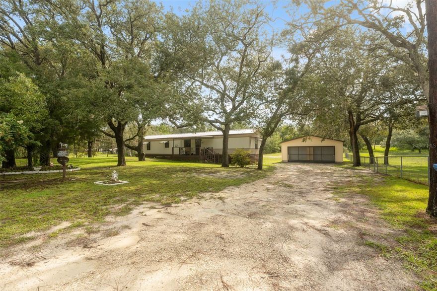 Welcome to this 3-bedroom, 2-bath home located in the desirable Highland Lakes subdivision. Nestled on an oversized half-acre lot, this property offers both space and privacy. A detached garage workshop provides the perfect space for projects, storage, or hobbies, while an additional shed adds extra convenience. The home's open layout flows effortlessly between the living, dining, and kitchen areas, making everyday living and entertaining a breeze. The kitchen is well-appointed, and each bedroom includes generous closet space, with the primary suite featuring its own private bath. Step outside to enjoy the screened-in back deck—ideal as a 3-season room for relaxing or entertaining year-round. The 2-car garage is fully screened, perfect for additional covered space or shaded gatherings. For those who love the outdoors, you’re just minutes from Weeki Wachee Springs State Park for kayaking and swimming, or head over to Pine Island Beach to swim in the Gulf. The Bayport boat ramp is also nearby, offering direct access to the Gulf for boating and fishing adventures.