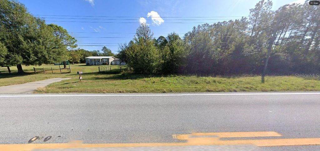 Photo of Old Grade Rd, Polk City, FL 33868 (MLS # O6266204)