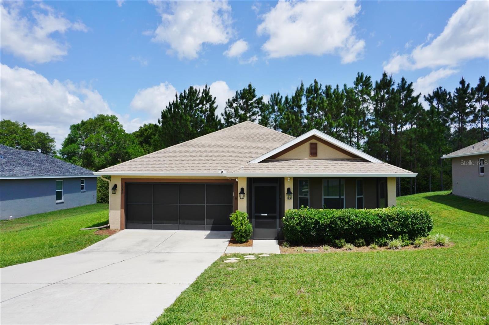Live the Florida Lifestyle in this small community of about 150 homes in a desirable location just minutes to stores, restaurants, doctors, banks with sidewalks that lead to the elementary school and library. Also within a short drive to explore our nature coast at the Homosassa Springs Wildlife Park, Rainbow Springs State Park, Withlacoochee State Trail, Three Sisters Springs, Hunter Springs and the many lakes and rivers that lead to the Gulf of Mexico. This 2018 built home on a cul-de-sac is ready for you to move in. Welcome your guests on the screened front porch. Step inside where bedroom 2 & 3 are split by the hall bath just off the foyer. Down the hall is the open great room, island kitchen and dining area with views of the back landscape with lovely planted pines and line of trees that create a privacy border for the subdivision. The spacious master suite has a private bath with dual sinks, garden tub and walk-in shower. Structural warranty from Maverick thru May 2028 (Tranfer fee $40) Come take a look and see all this home offers! (lawn mower does not convey)