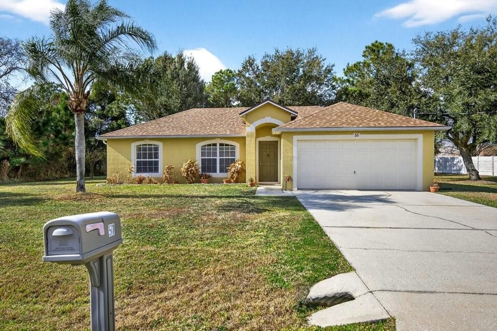 Photo of 51 Longfellow Drive, Palm Coast, FL 32137 (MLS # FC315809)