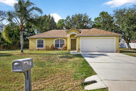 Photo of 51 Longfellow Drive, Palm Coast, FL 32137 (MLS # FC315809)