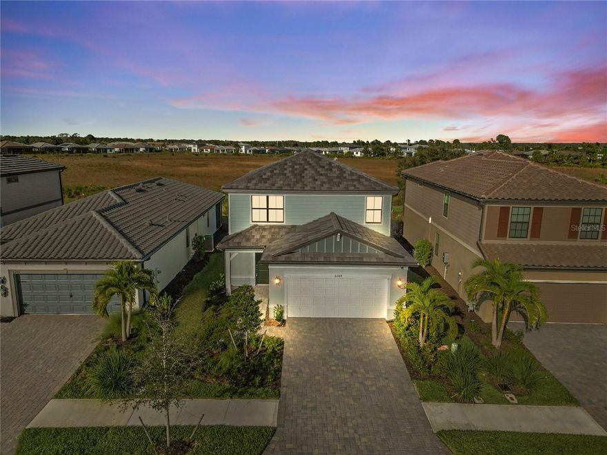 Looking for a Rental??  Great Investment opportunity in Sunny Talon Preserve. Currently Fully Rented and Income Producing. BETTER THAN THE BUILDER AND IS THE ONLY 4 BED 3 BATH AVAILABLE.  Why wait a year for new construction? This beautiful like new 2023 home is leased and producing solid income, located in Talon Preserve, one of the area's most sought-after resort-style communities. Designed for families who love sunshine, adventure, and convenience, this home offers access to top-rated schools, shopping, dining, and the white-sand shores of Nokomis Beach, just 7 minutes away.  From the moment you enter the gated community with 24-hour security, you'll feel like you're on vacation every day. The incredible Amenity Center features a resort pool with rock waterfall, beach entry and lap lanes, splash pad, kids’ play area, 8 pickleball courts, tennis and bocce ball, plus an 18,000 sq ft clubhouse with a state-of-the-art fitness center, training studio, arcade, and full bar. Weekly events and a calendar of activities bring neighbors together and make this a true community.  Adventure awaits right outside your door with direct access to the Legacy Trail, perfect for biking, jogging, or family walks through 110 acres of pristine preserve and 62 acres of lakes and scenic walkways.  Inside, this 4-bedroom, 3-bath home is thoughtfully designed for growing families. The first floor features a private guest suite or mini-master with its own full bath ideal for in-laws, guests, or a quiet work from home retreat. The open-concept main living area flows into a chef’s dream kitchen with gourmet appliances, quartz countertops, upgraded backsplash, a 5-burner gas cooktop, walk-in pantry, and oversized island, perfect for cooking or helping with homework.   Upstairs, you'll find a versatile loft area that can serve as a playroom, game room, or media space, along with a spacious primary suite featuring a luxury bath with walk-in shower, bench seating, and an extra-large walk-in closet. Two additional bedrooms are generously sized with ample storage.  The finished 2-car garage with epoxy flooring offers extra storage space, while the fenced-in backyard provides a safe and private space for kids and pets with no rear neighbors for added peace and privacy.  Whether you're entertaining indoors or enjoying a relaxing evening outside, this home offers the perfect blend of comfort, community, and convenience for your growing family.
