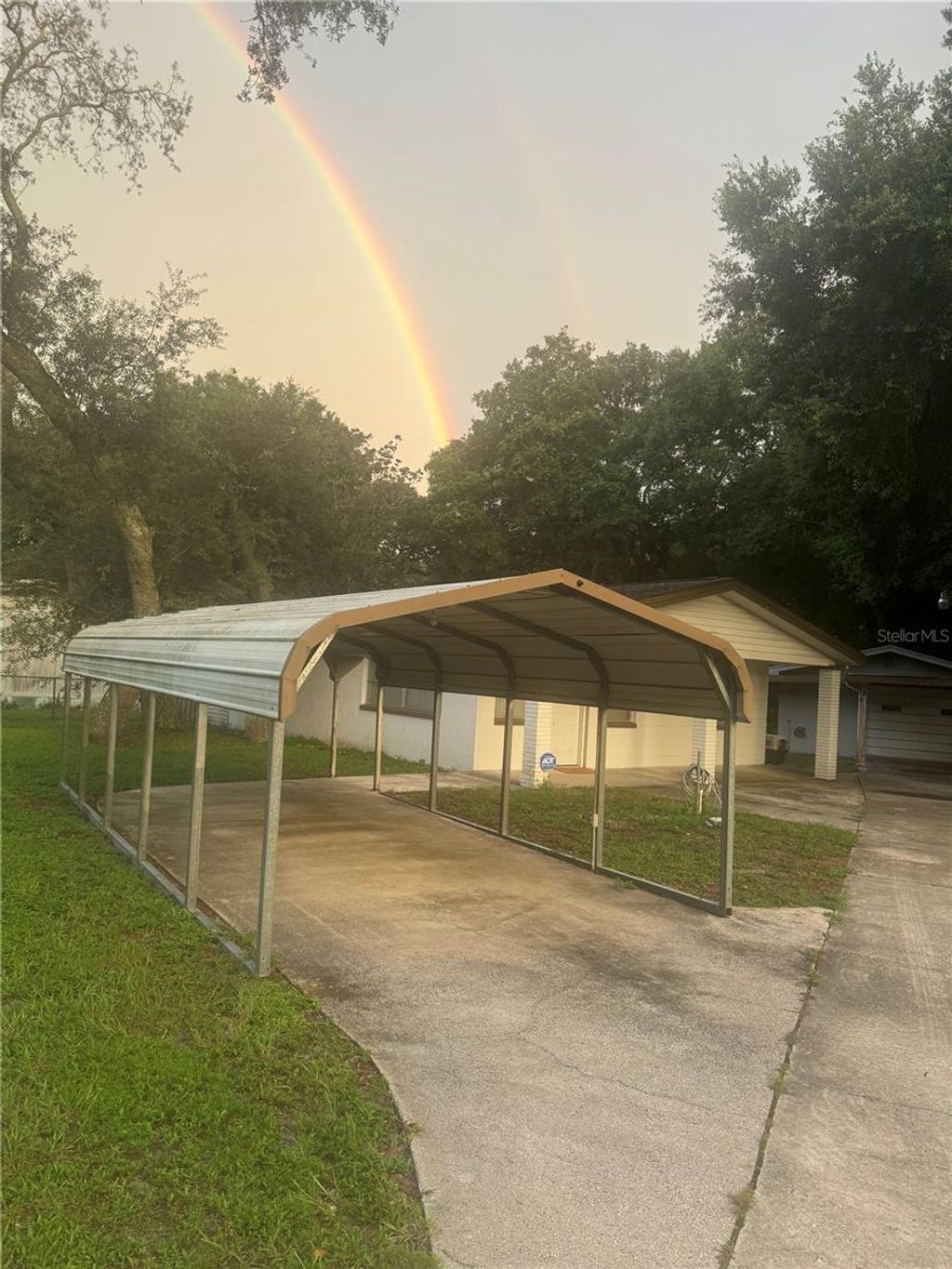 Photo of 2011 E 148th Avenue, Lutz, FL 33549 (MLS # TB8426466)