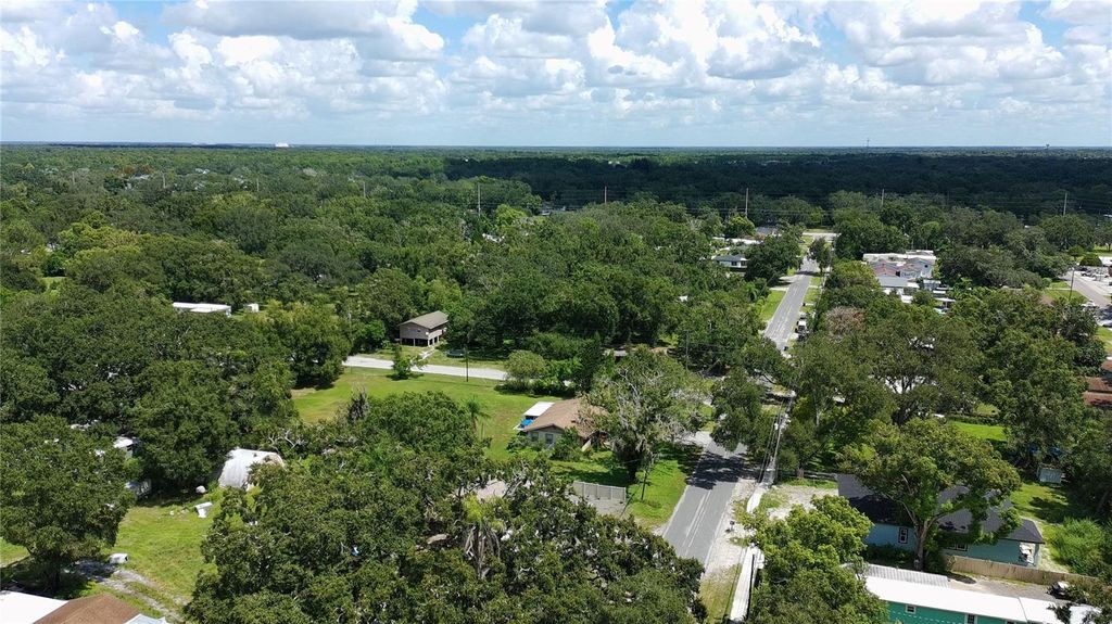 Photo of 2011 E 148th Avenue, Lutz, FL 33549 (MLS # TB8426466)