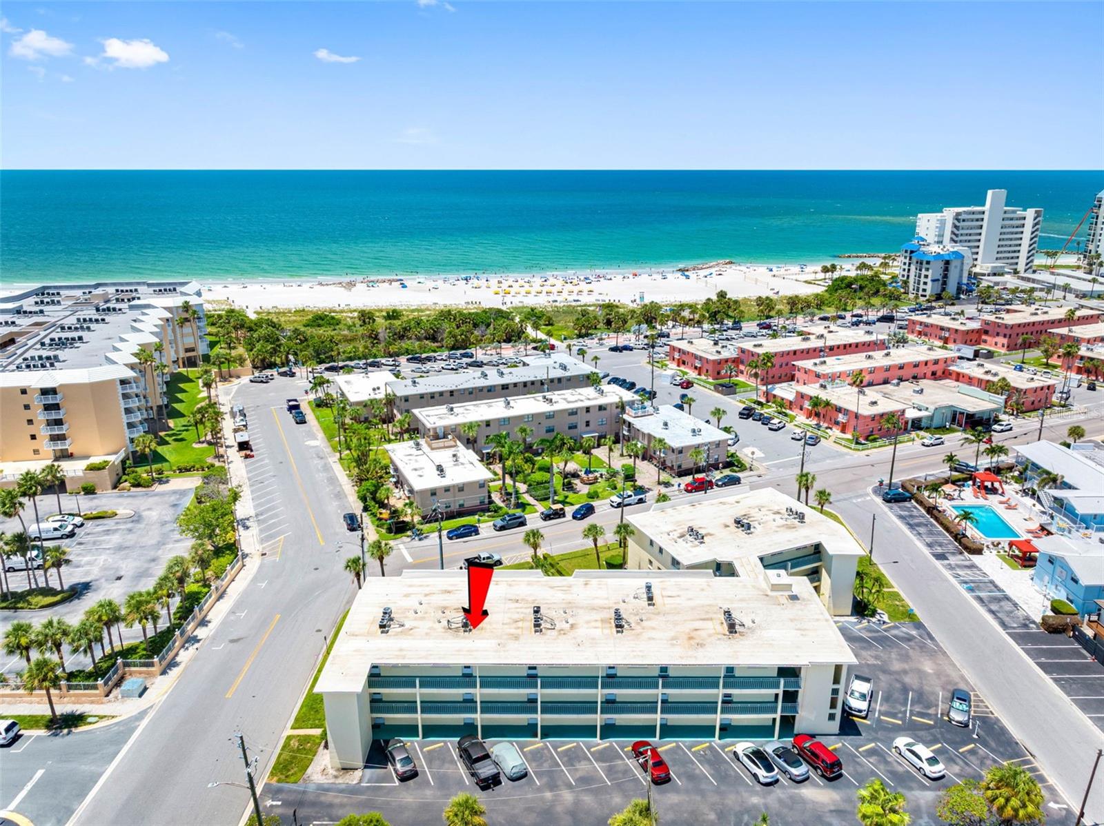 This well maintained 2-bedroom, 1.5-bath top-floor condo at the desirable Gulf Claridge of St. Pete Beach offers everything you’ve been dreaming of in a beachside retreat—and peace of mind to go with it. This unit remained high and dry through two of the largest hurricanes of the past century, and the building has already passed its Milestone Inspection and is fully SIRS compliant. Copy and paste this link to see the video https://youtu.be/7BimpFUiI9U. You'll fall in love with the prime location, just a few steps from the pristine sands of St. Pete Beach—rated #1 in the U.S. Forget about hunting for beach parking—your assigned space (#105) means you can grab your beach chair and go! Enjoy balmy breezes and sunny views from your beach-facing enclosed sunroom. The condo has been well cared for by long-time owners and features engineered hard wood flooring throughout the living and dining areas. The Refrigerator, Stove and Microwave are all new in 2024 plus a new AC condenser in 2022 and hurricane shutter motors and electric panel in 2023. This condo is sold furnished - 2nd BR bed has pull-out and sleeps 5. #303 is conveniently located close to both the elevator and your parking space. 3-story concrete block building with major updates including a new roof (2021), plumbing (2023), and elevator (2019), building replaced all windows. The community offers a peaceful outdoor courtyard with lounge space and BBQ grill, plus ample storage including locked personal storage for each owner (2nd floor), bike storage (3rd floor) and laundry facilities on every level. Everything you need is nearby including restaurants, shops, banking, the Corey Avenue Sunday Market, the library, beach bars, and the SunRunner express to downtown St. Petersburg and just a short drive to: downtown St. Pete (18 mins) with world-class dining, museums, and the new Pier; Gulfport, an artsy bayside village (11 mins), Fort DeSoto Park with 1,136 acres of nature and recreation (16 mins), Tampa International Airport (45 mins). Don’t miss your chance to own a slice of paradise! Schedule your private showing today.