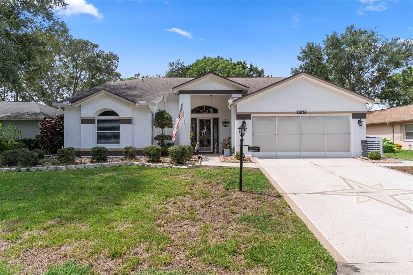 Welcome to this totally updated POOL HOME. SOLAR HEATED POOL WITH NEWER POOL PUMP. The open floor plan is so inviting to entertain guests and family. Upon entering the home through the etched lead lass font door you will notice the unique architectural flare of the arched entrance to the family room and the crown moldings. This home has character and shows pride of ownership. Once inside the family room thee custom built wet bar will be sure to catch your eye. The updated kitchen offers tons of cabinets and granite counter tops with a new microwave. New matching luxury vinyl flooring throughout except for the bathrooms and kitchen, Beautiful newer hurricane impact windows and sliders modernize this home. Welcome out back to your large pool deck which is large enough for many pool parties in your oversize 12X34 pool that is 6.5ft deep. In addition the newer hot tub will convey with the home. The pool cage has been recently rescreened and the home includes storm curtains to protect the lanai area. The home offers an inside laundry room with a 2 car garage that contains a club car golf cart included in the sale of the home. Attic fans and gutter guards were recently installed. In addition the primary bathroom has a walk in shower with no step down. This home will be perfect for your Florida living. In addition the home is located in the resort community of TIMBER PINES. Live in and enjoy this active and amazing community with 4 golf courses, 2 putting greens, a driving range, 2 pro--shops, tennis, pickleball, a multimillion dollar fitness center, 2 community pools and hot tubs, a full time restaurant, and a performing arts center. Numerous clubs and activities along with great entertainment throughout the year. Call today for a showing.