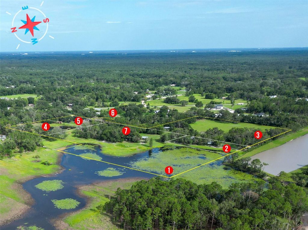 Photo of 22839 Bungalow Lane, Land O Lakes, FL 34639 (MLS # TB8390406)