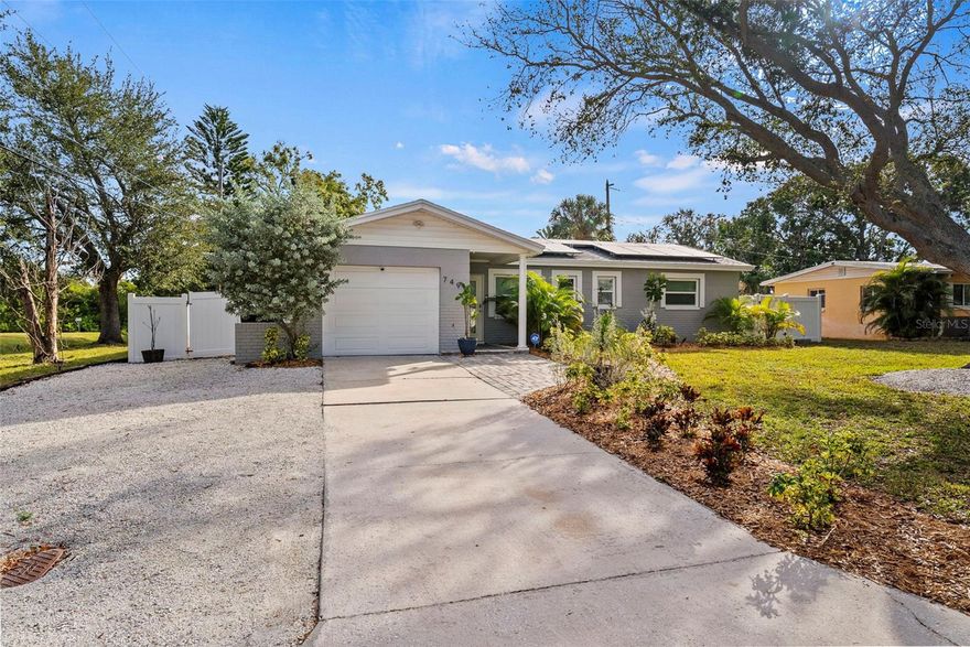 Welcome home to a beautifully renovated single-family residence offered as an annual lease, where space, style, and value come together effortlessly. This beautifully updated rental features three bedrooms, two bathrooms, a large bonus room, and an oversized enclosed sun porch, offering exceptional flexibility for comfortable everyday living. Inside, you’ll love the stunning modern updates and timeless Terrazzo floors throughout, while outside the fully fenced property reveals a true backyard oasis complete with artisan pavers, thoughtful landscaping, and a storage shed. Additional highlights include a one-car garage with a full-size washer and dryer, plus a solar panel system that helps keep monthly energy costs very low. To make life even easier, the landlord covers lawn care, pest control, and water softener servicing. Up to two pets may be considered with landlord approval, making this an ideal opportunity for anyone seeking a spacious, stylish, and low-maintenance annual rental that truly feels like home.