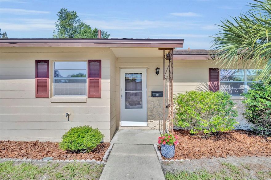 Welcome to effortless Florida living in the highly desirable Villa Villar 55+ community in beautiful DeLand. This completely updated 2-bedroom, 2-bath condo offers the perfect blend of modern upgrades, low-maintenance living, and an unbeatable location just minutes from historic downtown DeLand. Inside, you’ll find a bright open floor plan featuring luxury vinyl flooring throughout, stunning quartz countertops, brand-new cabinetry, all new stainless steel appliances, a deep modern sink, updated lighting, and stylish new ceiling fans throughout the home. The spacious living and dining areas flow seamlessly into the inviting Florida room and private screened-in back porch—perfect for relaxing mornings or quiet evenings. The oversized bedrooms give exceptional storage and comfort, while the primary suite features an updated ensuite bathroom with a beautifully tiled shower and brand-new vanity. Both bathrooms have been fully renovated with modern finishes and clean, timeless design. Additional highlights include inside laundry, reserved private parking, and ample guest parking throughout the community. Villa Villar offers true maintenance-free living with exterior grounds professionally maintained by the association. Monthly condo fees include water, sewer, trash, and building insurance, making this an affordable and stress-free option for full-time residents or seasonal living. Enjoy a peaceful, beautifully landscaped setting with walkability to Earl Brown Park, featuring scenic walking paths, mature trees, public tennis courts, and pickleball courts. You’re also just minutes from vibrant downtown DeLand, home to the historic Athens Theatre, local boutiques, coffee shops, and an incredible selection of restaurants and entertainment. Move-in ready, beautifully updated, and ideally located—this is the low-maintenance Florida lifestyle you’ve been waiting for.