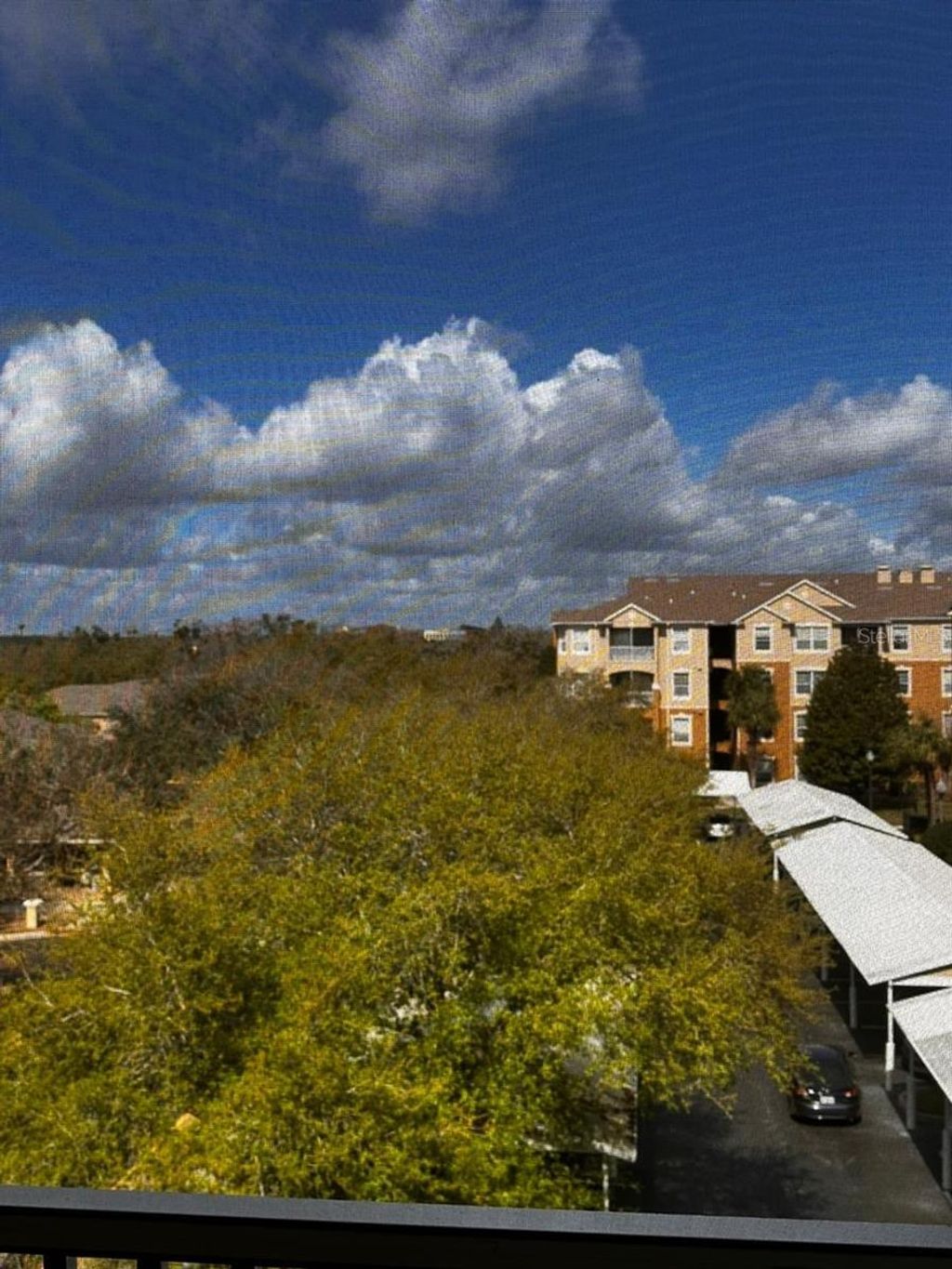 Photo of 2484 San Tecla Street #403, Orlando, FL 32835 (MLS # O6390453)