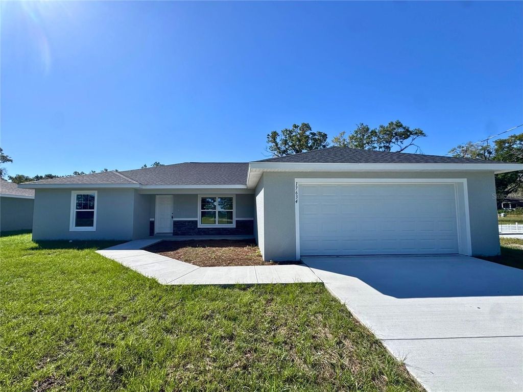 Photo of 12557 SW 94th Lane, Dunnellon, FL 34432 (MLS # OM716695)