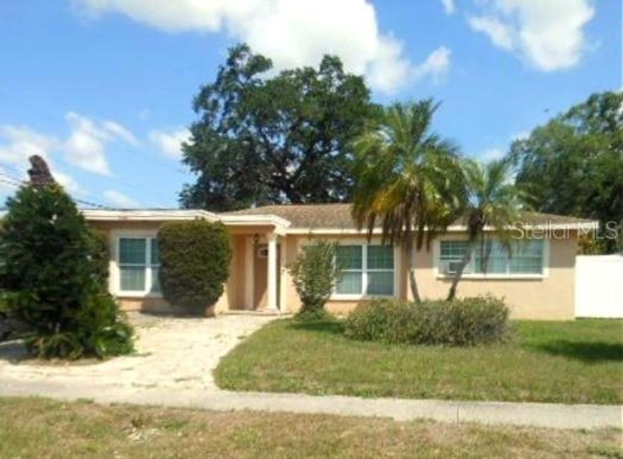 Welcome to the Tampa Florida lifestyle with easy access to Downtown, Lightnig Arena, Bucaneer Stadium, Busch Gardens and USF. High and Dry Far West of the Hillsborough River. This Move-In Ready Ranch Style home has many upgrades. The Beautifully Updated Kitchen includes Stainless Steel Appliances & Eat In Counter adjacent to a Large Private Dining Room. The updated Ceramic Tile Bathroom Features a Jacuzzi Tub and Walk in Shower. The Outdoor Spaces feature a Party Patio which has a Brick Paver Deck with Stylish Wood Pergola and outdoor Lighting. A Must See is the paved Parking area in the rear for trailers, Boats, RVs. In the rear corner of the back yard is an Amazing Twisted Oak Tree. This Ideal Location is A Sweet Spot between Dale Mabry West, Aremenia to the East, Sligh to the North and Hillsborough to the South. Today is the Day to Make this Place Your Special Living Space.