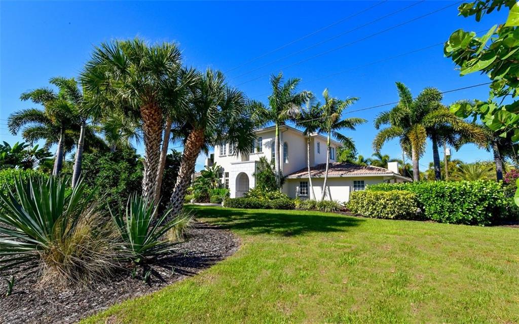 Absolutely gorgeous turnkey furnished home on Lido Shores. This turnkey furnished two story house has a whopping 3,211 square feet, four bedrooms, three bathrooms, two master suites, living room/kitchen/breakfast nook combination, formal living area, laundry room with plenty of counter space and a utility sink, vaulted ceilings, three bedrooms on the first floor and one of the master suites on the second floor. The primary bedroom retreat has a king sized bed, a bedroom balcony that looks out to the private pool, a separate sitting room with balcony, double walk in closets, on suite spa like bathroom with double sinks, stall shower, garden tub and water closet. The downstairs second primary suite has a king sized bed, on suite bathroom with a stall shower and easy access to the first floor of the house. 1st guest bedroom has a queen sized bed and the 2nd guest bedroom has two twins. The fully equipped kitchen has stainless appliances, gas stove, breakfast table, island with seating, a walk in pantry, is wide open to the living room and has views to the outdoor kitchen and pool. The living room has a large sitting area with built in wine fridge/bar, a gas fireplace and sliders that open to the beautiful Florida outdoors and pool area. The tiled pool has an open sided cabana with an outdoor kitchen, bar seating, gas fire place and large dining area. A second outdoor yard rounds out the property. Two car garage with use of one side only as the owner uses one of the sides with their own car. Lido Shores offers private beach access and is very conveniently located near St. Armand's Circle, Longboat Key and downtown Sarasota. This property is available now for a short term booking. Call today as it will not last long.