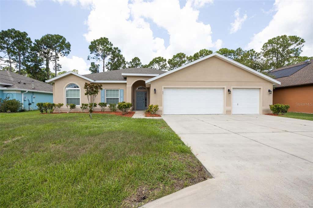 Photo of 95 Bickford Drive, Palm Coast, FL 32137 (MLS # FC320598)