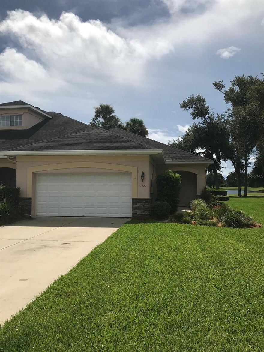 This is a Lovely 2 bedroom 2 bath end unit! It has a great open layout with a nice screened in porch with an awesome view of the golf course and pond.