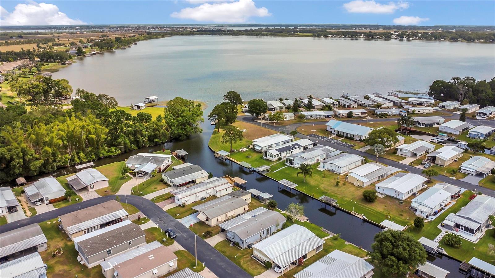 Charming Waterfront Home in a Quiet 55+ Community – 119 Jana Circle in Auburndale. Lake life is calling YOUR name!
Welcome to your slice of Florida paradise! Nestled in a peaceful 55+ waterfront community, this 2-bedroom, 2-bathroom home offers canal access to scenic Lake Mariana. Enjoy tranquil mornings and serene evenings from your private dock, or relax in the bright and airy Florida Room overlooking the water. Lake Mariana is a 514 acre lake with great fishing. Unload the kayak or jet skis right from your private dock in your backyard and head to the lake through the canal for a fun filled day...every day!
This home boasts spacious living areas, perfect for entertaining or quiet evenings in. The brick paver driveway adds curb appeal and convenience, while the manicured lawn enhances the home's welcoming charm. Designed for low-maintenance living, you’ll have more time to enjoy the community and nearby lake life.
Whether you're looking for a full-time residence or a seasonal retreat, 119 Jana Circle offers a rare opportunity for waterfront living in a friendly and active community.
Don’t miss your chance to own a canal-front gem with direct lake access — schedule your showing today!