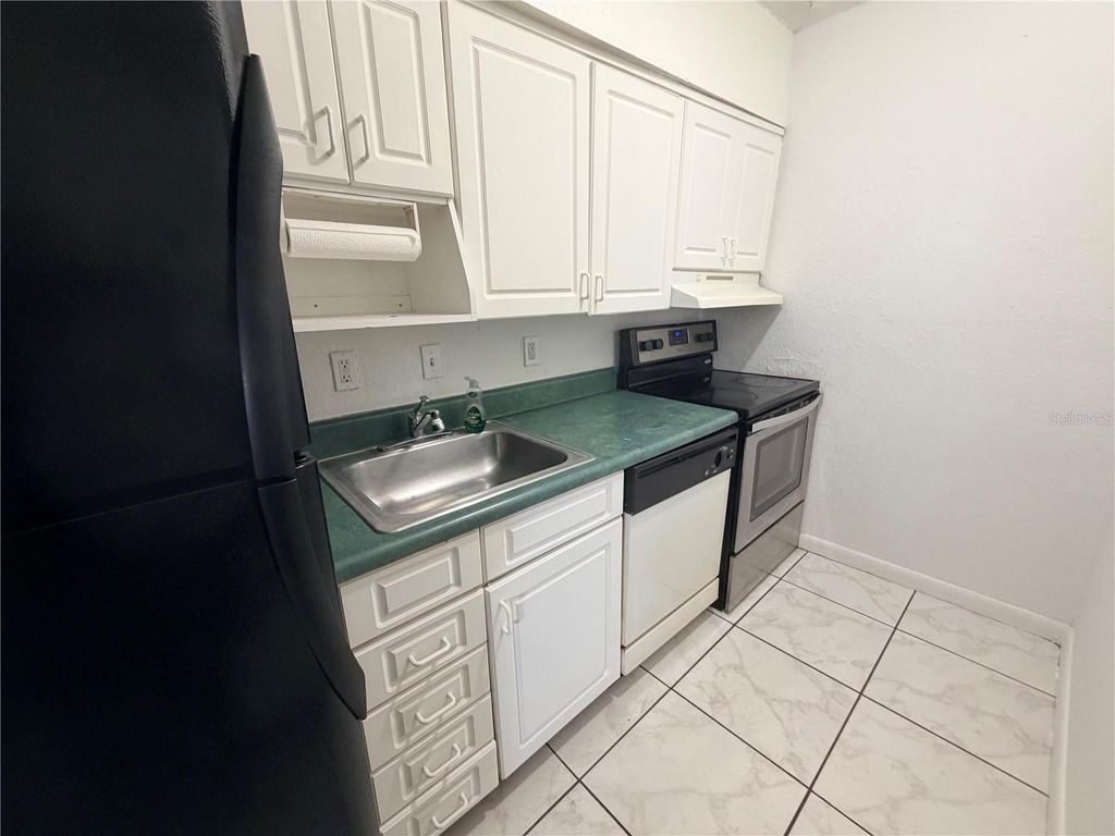 Photo of 738 Ridenhour Circle #L, Orlando, FL 32809 (MLS # O6383477)